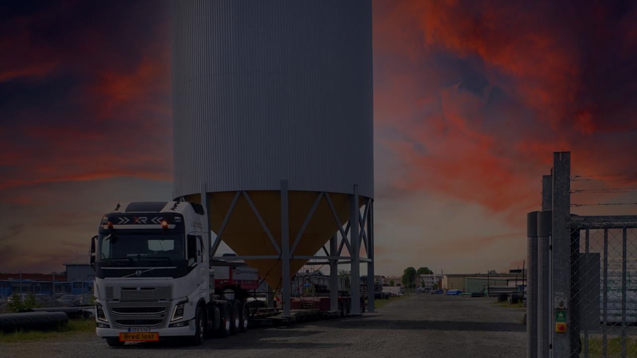 XR truck parked next to silo